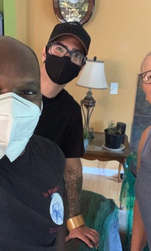 The Wright Move Team Wearing Face Masks and a Happy Client. Moving Services For The Elderly.